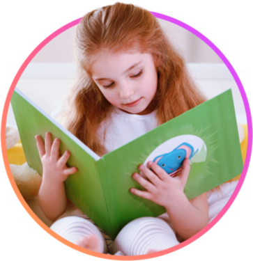 A young girl holding and reading a book